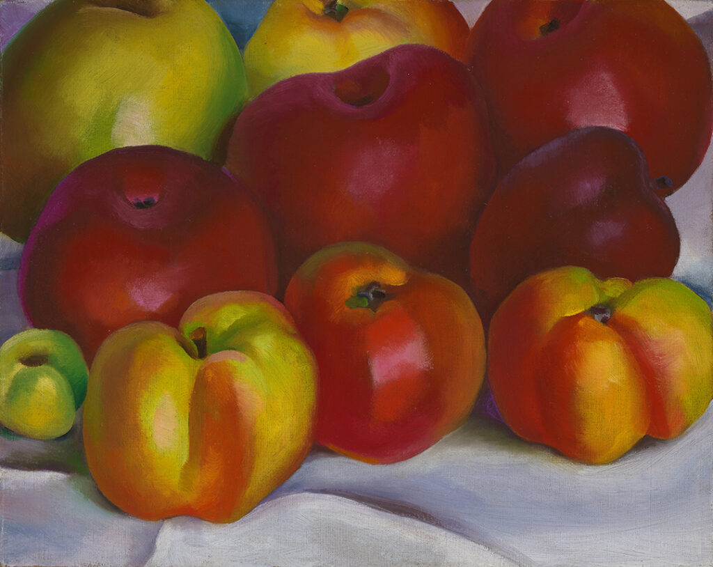 Small horizontal canvas with a grouping of ten apples of various colors and sizes on a white cloth. Apples fill the majority of the canvas, as in a close-up, hence color dominates most of the canvas.