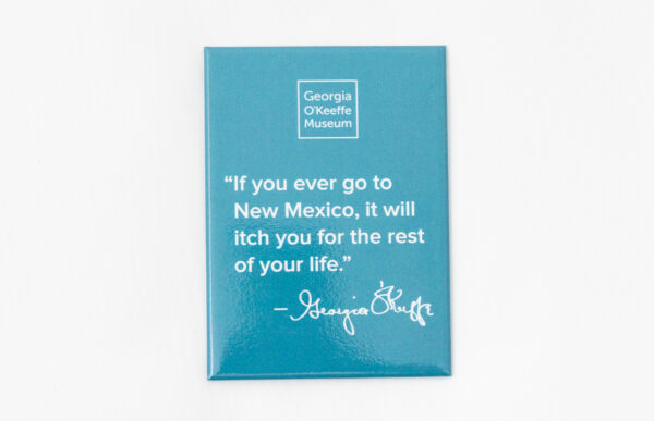 Blue magnet with quote "If you ever go to New Mexico, it will itch you for the rest of your life."